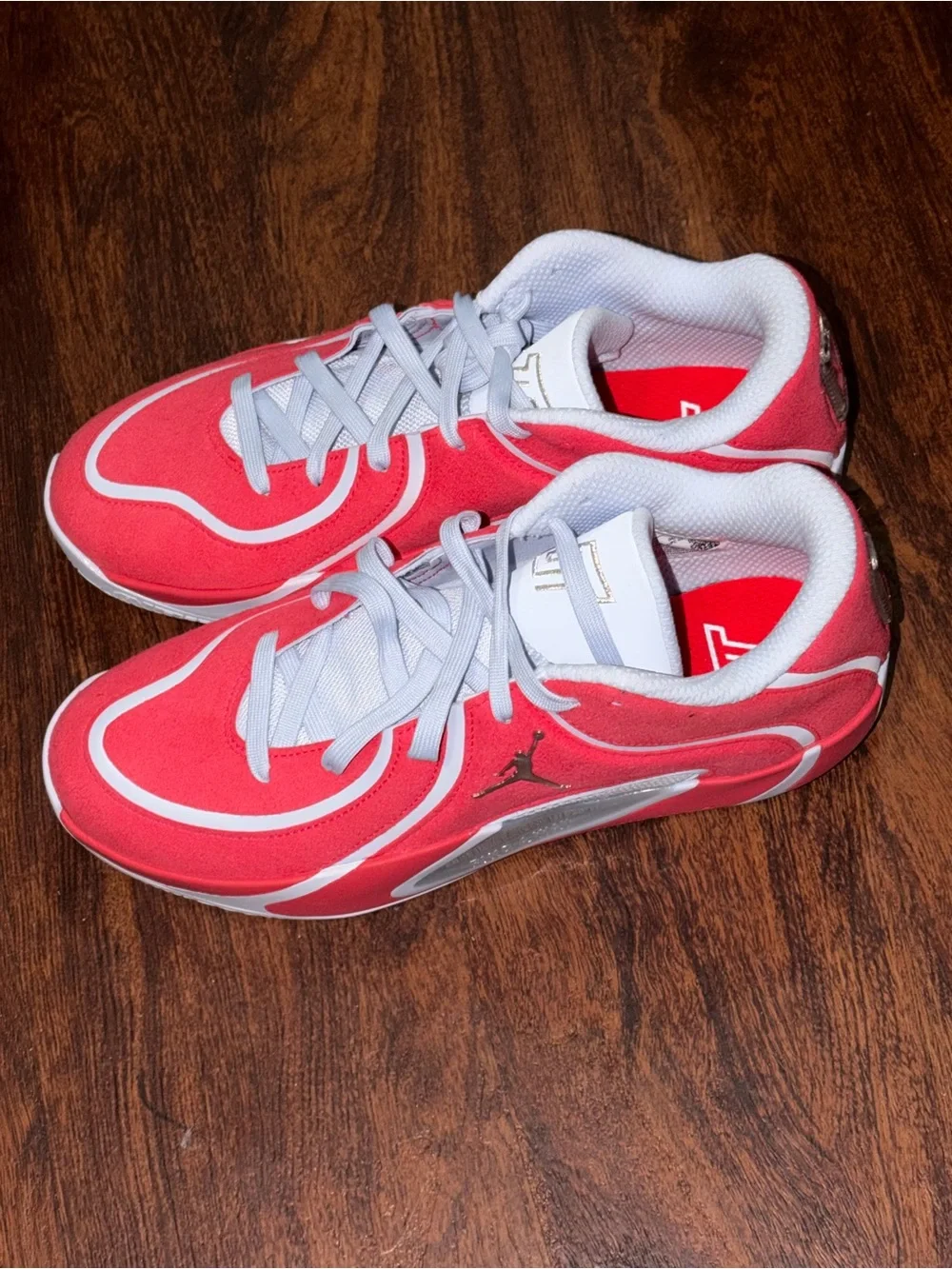 Red Jordans size 9.5 Tatum basketball shoes